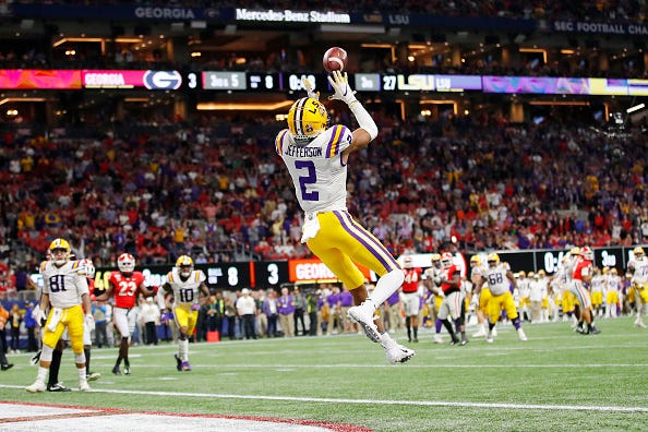 LSU WR Justin Jefferson goes up for a TD catch in the SEC Championship Game.