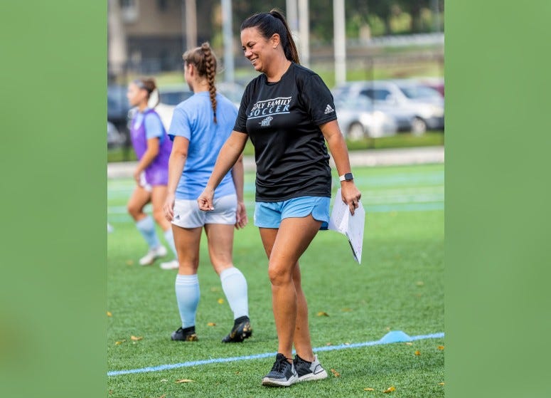Holy Family women's soccer coach Jill Reeves on the pitch.
