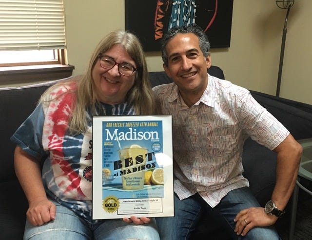 Jonathan & Kitty with their Best of Madison certificate