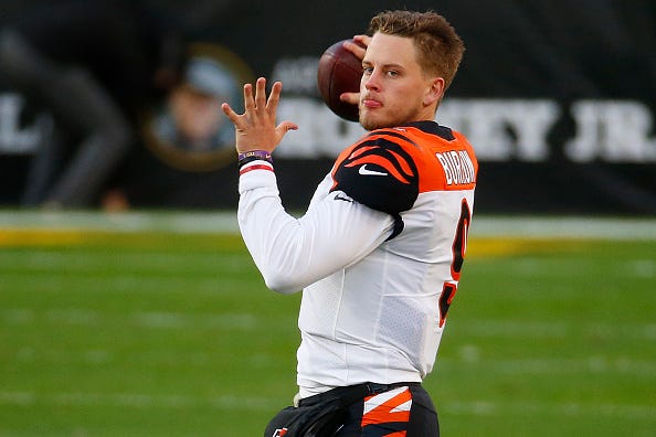 Joe Burrow warms up before a Bengals game.