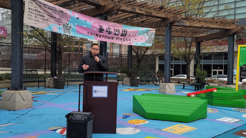 John Chin, executive director of the Philadelphia Chinatown Development Corporation, speaks in the park.