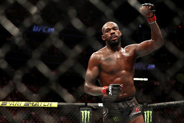 Jon Jones celebrates a UFC Light Heavyweight Title bout.