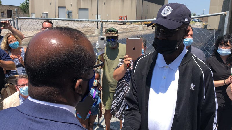 Officer Juan Phillips is greeted by Buffalo Mayor Byron Brown after his release from ECMC. Phillips fought coronavirus for more than 100 days. July 2, 2020 (WBEN Photo/Mike Baggerman)