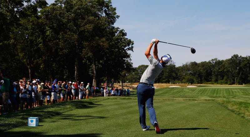 Justin Rose hits his tee shot on the 12th hole during the third round of The Barclays on the Black Course at Bethpage State Park on Aug. 27, 2016.