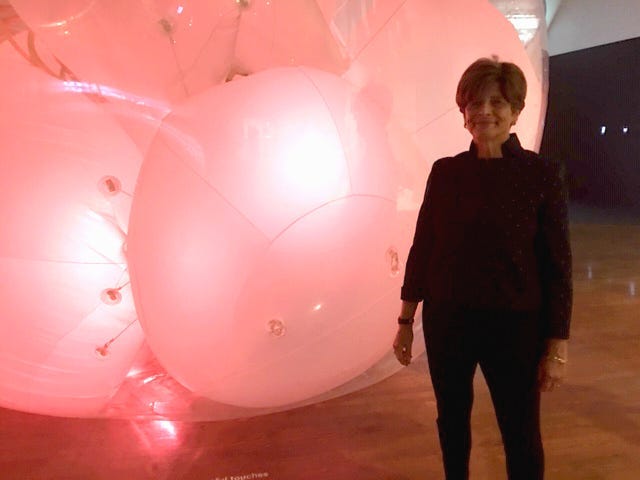 Kathryn Hiesinger, curator of decorative arts and design, in front of a giant balloon that breathes.