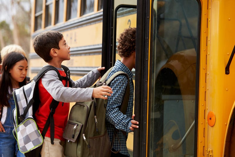 Kids boarding school bus