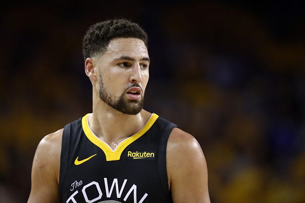 Klay Thompson looks on during a Warriors game.