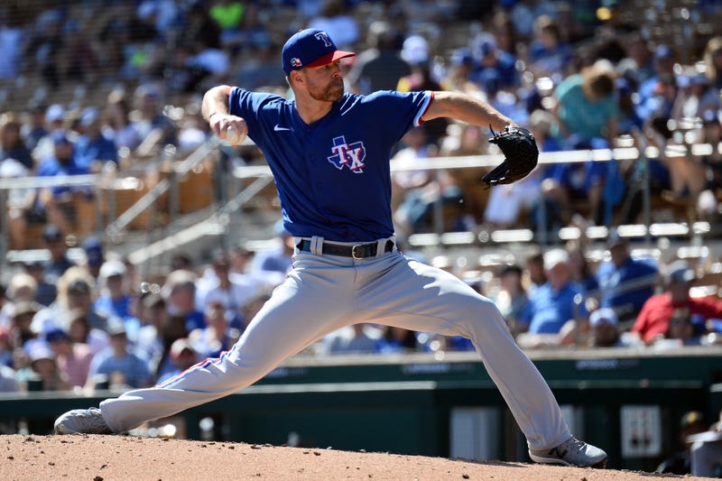 Corey Kluber pitches for the Rangers during a spring training game.