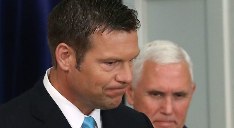 FILE PHOTO: Then KS sec'y of state Kris Kobach at a meeting in DC with VP Pence