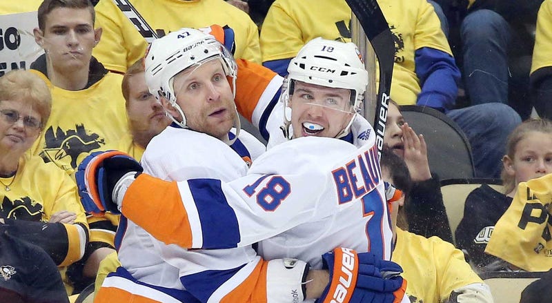 Apr 14, 2019; Pittsburgh, PA, USA; New York Islanders left wing Anthony Beauvillier (18) congratulates right wing Leo Komarov. Mandatory Credit: Charles LeClaire-USA TODAY Sports