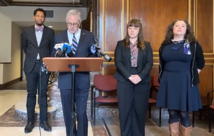 Philadelphia District Attorney Larry Krasner (center left) announced Tuesday he's filed a motion for reconsideration in the sentencing of former Philly police officer Eric Ruch. Ruch was sentenced to 11 to 23 1/2 months in prison for voluntary manslaughter.