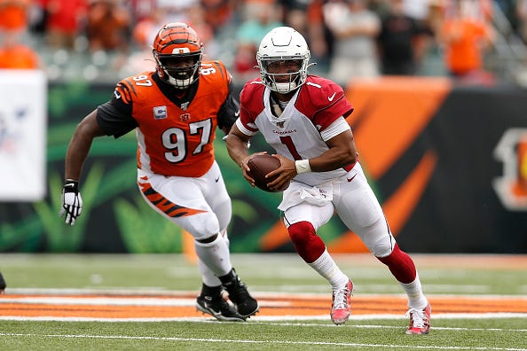 Cardinals QB Kyler Murray scrambles while looking for a receiver.