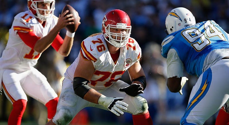 Laurent Duvernay-Tardif #76 of the Kansas City Chiefs blocks Corey Liuget #94 of the San Diego Chargers during a game at Qualcomm Stadium on November 22, 2015 in San Diego, California.