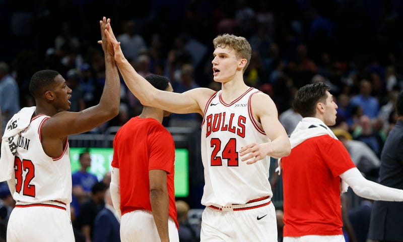 Bulls forward Lauri Markkanen (24) celebrates with guard Kris Dunn (32) after defeating the Magic.