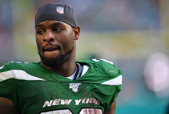 Jets RB Le'Veon Bell looks on during a game against the Dolphins.