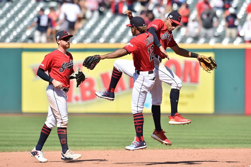 Cleveland Indians left fielder Jordan Luplow celebrates with shortstop Francisco Lindor and center fielder Oscar Mercado