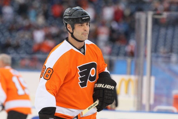 Eric Lindros suits up for an alumni game with the Flyers in 2012.