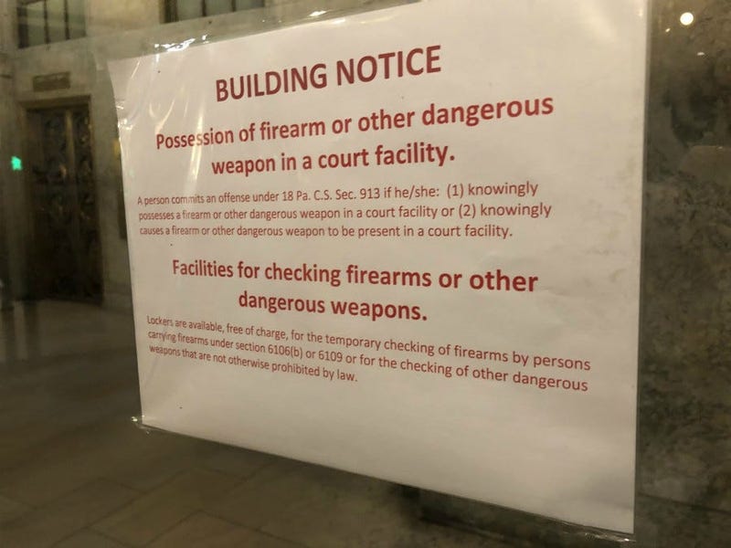The city of Pittsburgh has responded to a threat of legal action over signs posted outside the City-County Building warning that weapons are not allowed inside.