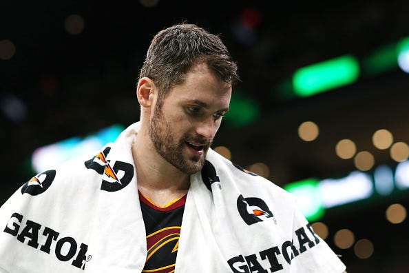 Kevin Love glances toward the bench during a game vs. Boston.