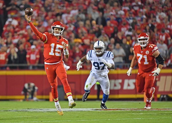 Chiefs QB Patrick Mahomes makes an off-balance throw against the Colts.