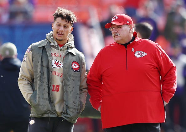 Patrick Mahomes and Andy Reid chat before a Chiefs game.