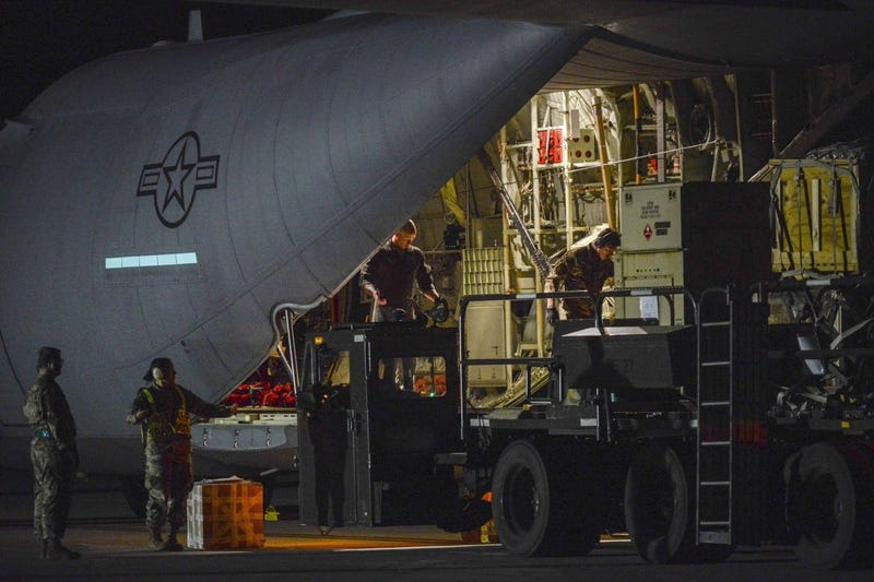 A C-130 Hercules stationed out of Ramstein Air Base, Germany delivers pallets of medical equipment to Aviano Air Base, Italy, March 20, 2020