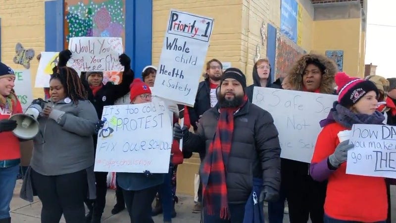 Parents and teachers demand the asbestos be fully removed from Alexander McClure Elementary School before students return to class.