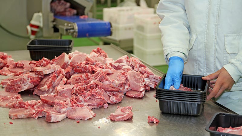 Fresh raw pork chops in meat factory