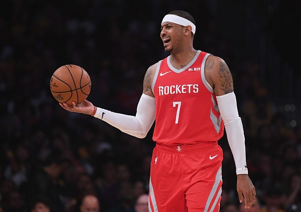 Carmelo Anthony expresses his displeasure with a call while on the Rockets.