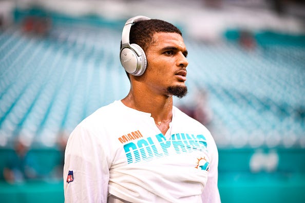 Minkah Fitzpatrick warms up with the Dolphins.