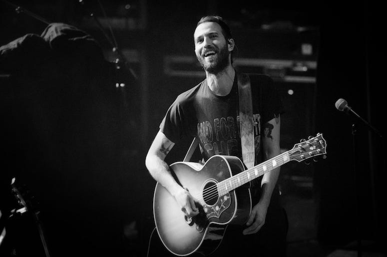 Mondo Cozmo performs at the 93XRT Holiday Jam concert.