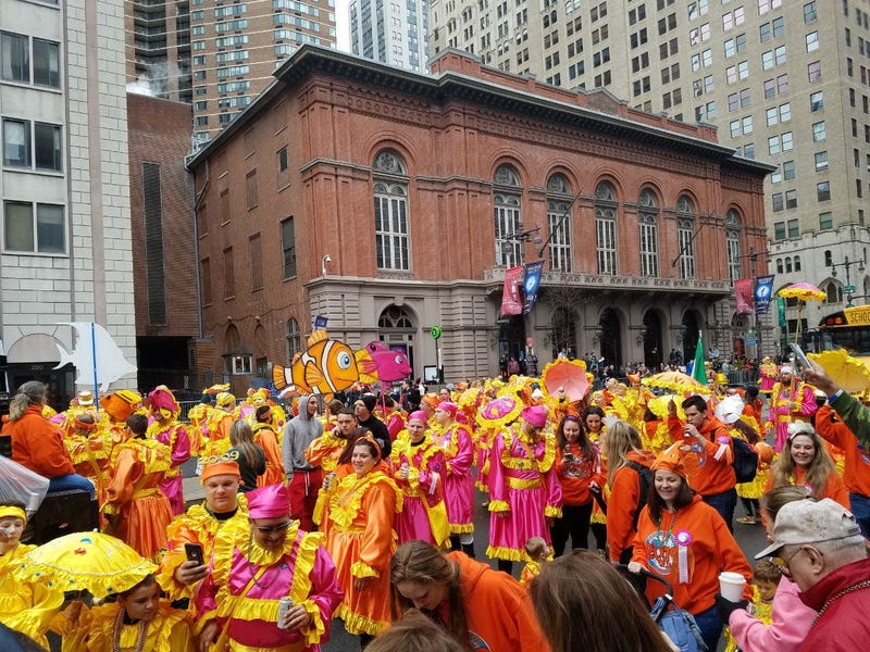 The annual Mummers Parade is in full swing on a surprisingly warm but windy New Year's Day.