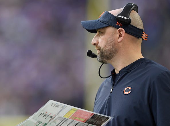 Bears head coach Matt Nagy relays the play call to the offense.
