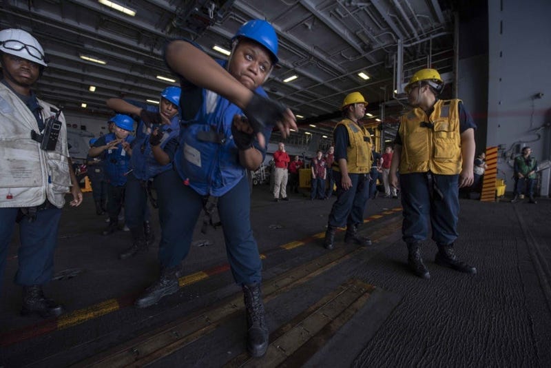 The first all-female underway replenishment (UNREP) rig team during a replenishment-at-sea (RAS)