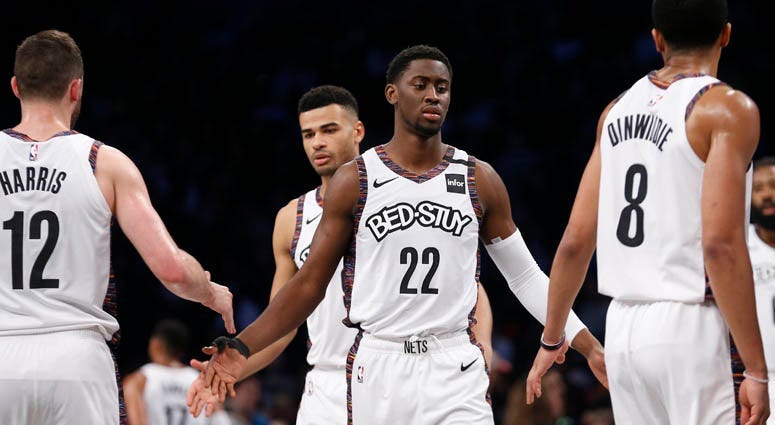 Pistons forward Blake Griffin dribbles the ball against Nets forward Rodions Kurucs on March 11, 2019, at Barclays Center.