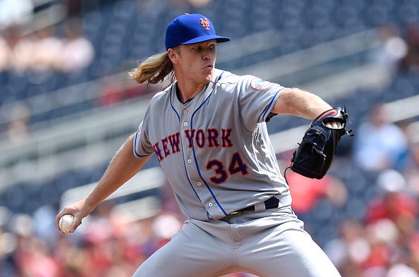 Noah Syndergaard of the Mets pitches against the Nationals.