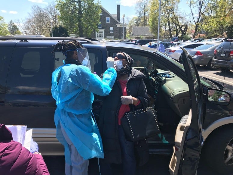 Dr. Octavia Pickett Blake, a volunteer with the Black Doctor COVID-19 Consortium, doing coronavirus tests.