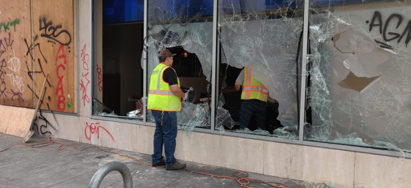 Smashed glass seen in Downtown Oakland following Friday's protest.