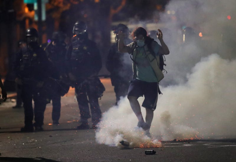 Tear gas used on a protestor in Oakland