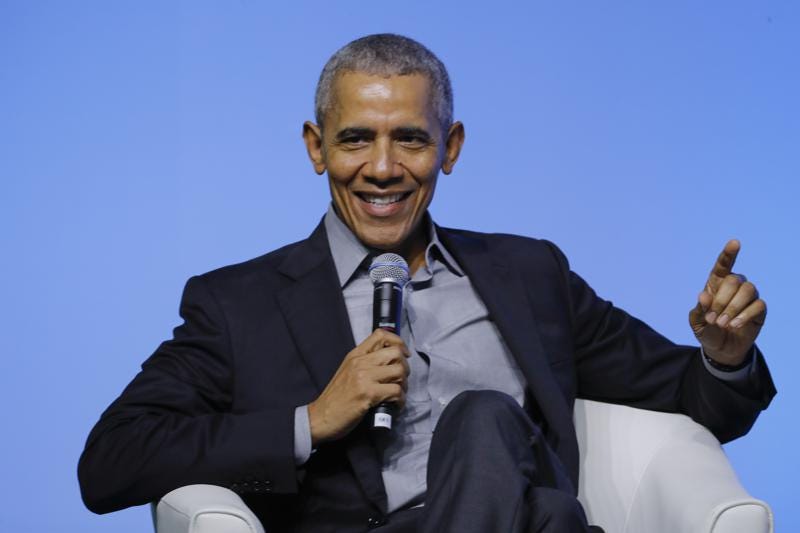 FILE - Former U.S. President Barack Obama gesture as he attends the "values-based leadership" during a plenary session of the Gathering of Rising Leaders in the Asia Pacific, organized by the Obama Foundation in Kuala Lumpur, Malaysia, on Dec. 13, 2019. Obama’s memoir “Dreams from My Father” will be released in a young adult edition on October 5. Obama had yet to hold any political office when “Dreams from My Father” was released in 1995.