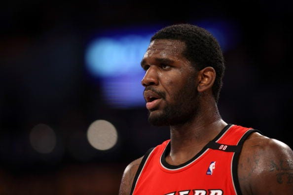 Greg Oden looks on during a game with the Trail Blazers.