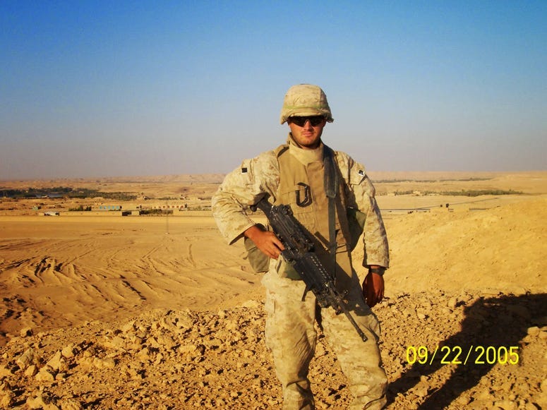Marine veteran Todd Winn during a deployment to Iraq in 2005. Winn gained national attention recently when he protested in uniform at the Utah state capitol until his shoes melted.