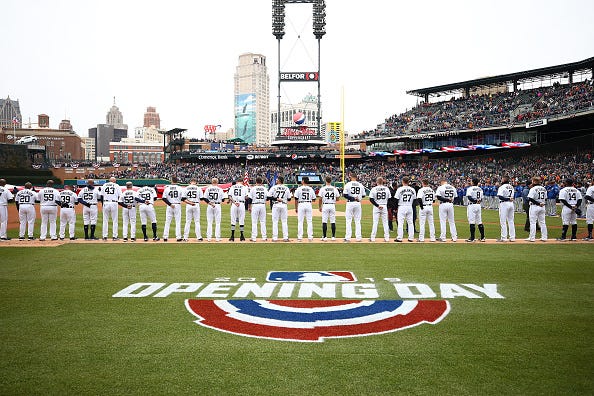 Detroit Tigers players stand for the national anthem on Opening Day 2019.