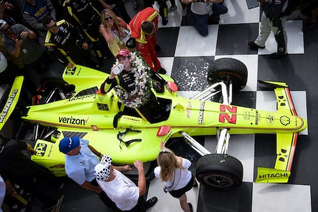 Team Penske's Simon Pagenaud Drinks The Milk In Victory Lane After Winning The 103rd Indianapolis 500