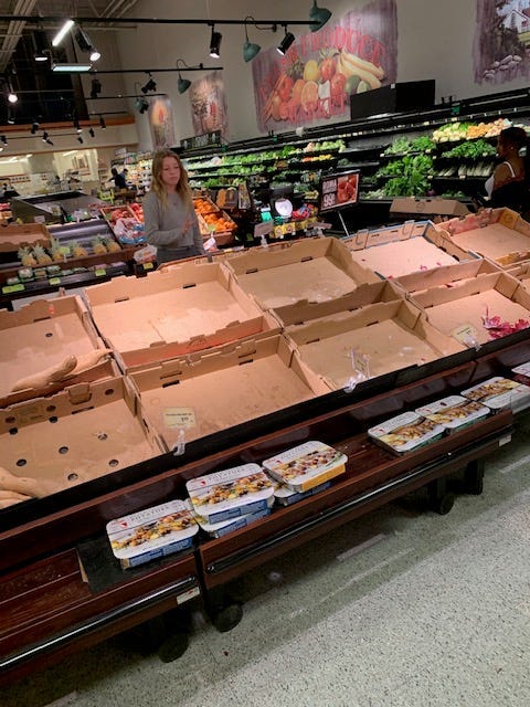 Shot of frustrated shopper and empty shelves