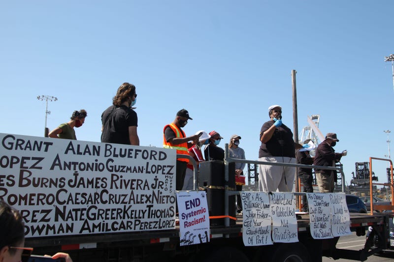 ILWU Local 10 members rally for workers' rights and an end to systematic racism at the Port of Oakland.