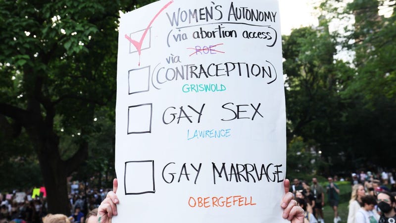 A person holds up a sign as they join people to protest the Supreme Courts 6-3 decision in the Dobbs v. Jackson Women’s Health Organization at Washington Square Park on June 24, 2022 in New York City.