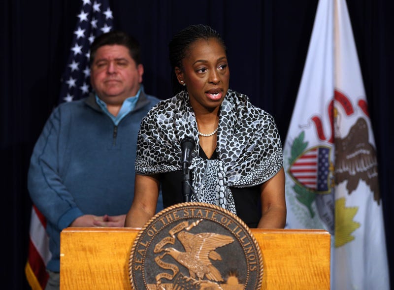 Illinois Governor J.B. Pritzker, left, and Dr. Ngozi Ezike, of the Illinois Department of Public Health