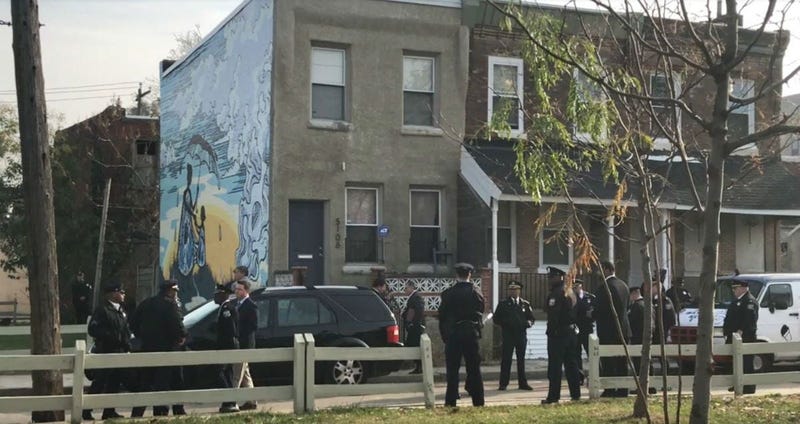 Four people were found killed in the basement of a home near 51st Street and Baltimore Avenue.