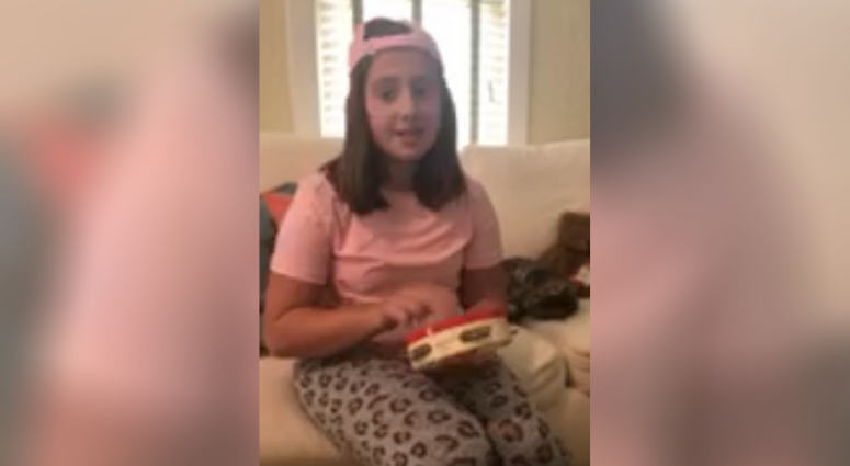 Kate Perlman performing her song on Quarantined Kids website